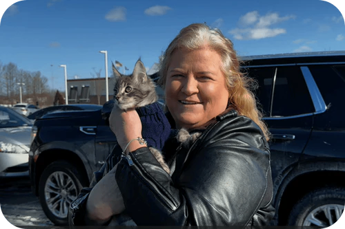Happy family with their puppy