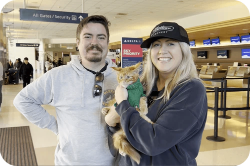 Happy family with their puppy