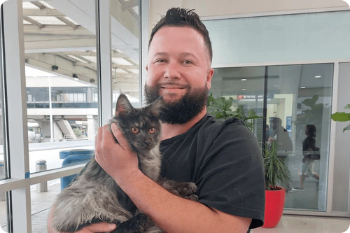 Happy family with their puppy