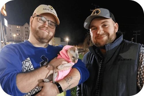 Happy family with their puppy